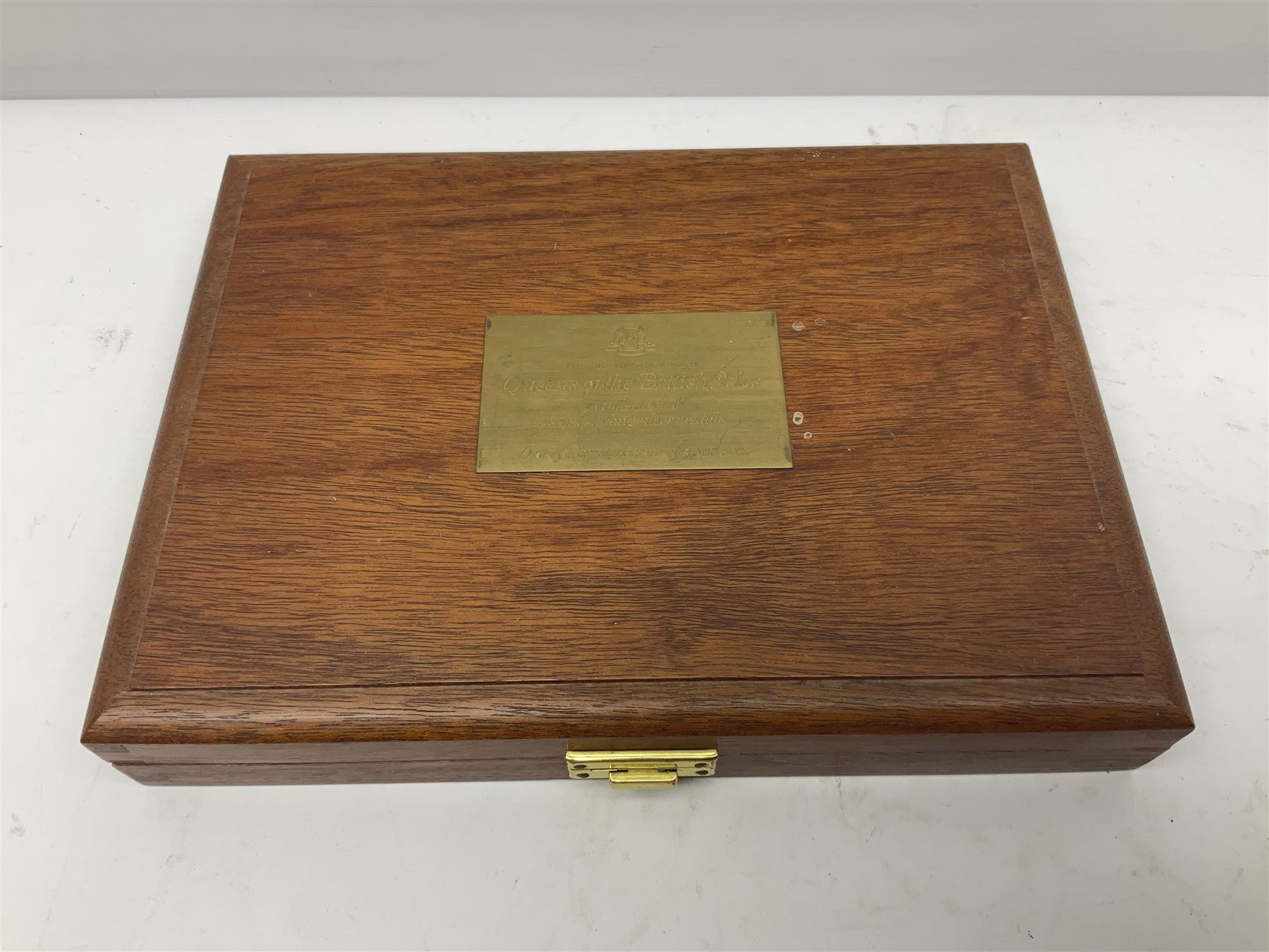 The Birmingham Mint 'The Queens Of The British Isles' sterling silver hallmarked nine medal set, housed in a fitted case, overall combined weight of the medals approximately 400 grams