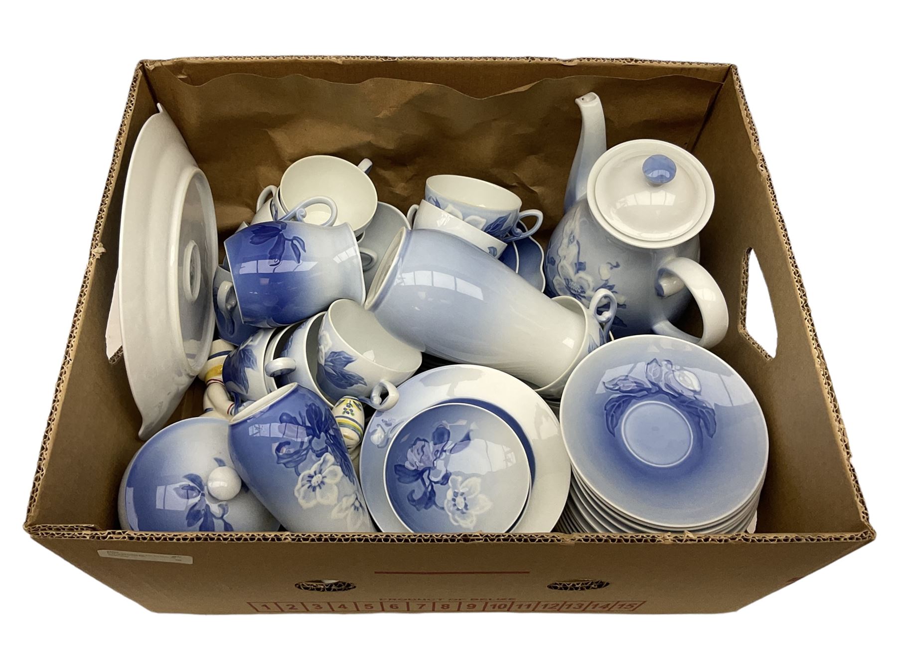  Bing & Grondahl, Copenhagen blue and white Christmas Rose pattern tea wares, to include teapot, covered sucrier, milk jug, fourteen cups and seventeen saucers, etc, together with two Royal Copenhagen collectors plates etc  