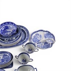Collection of blue and white dinner wares, mainly Wedgwood Willow pattern, including serving platter, dinner plates etc   