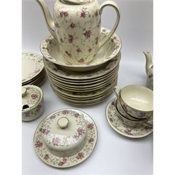 Bavaria tea and dinner wares, with floral spray decoration and gilt boarders, comprising of tea pot, coffee pot, sugar pot, cream jug, six coffee cups, five saucers, six side plates, five dinner plates, six soup bowls, one soup dish, one butter dish and lid and one serving bowl and lid.  
