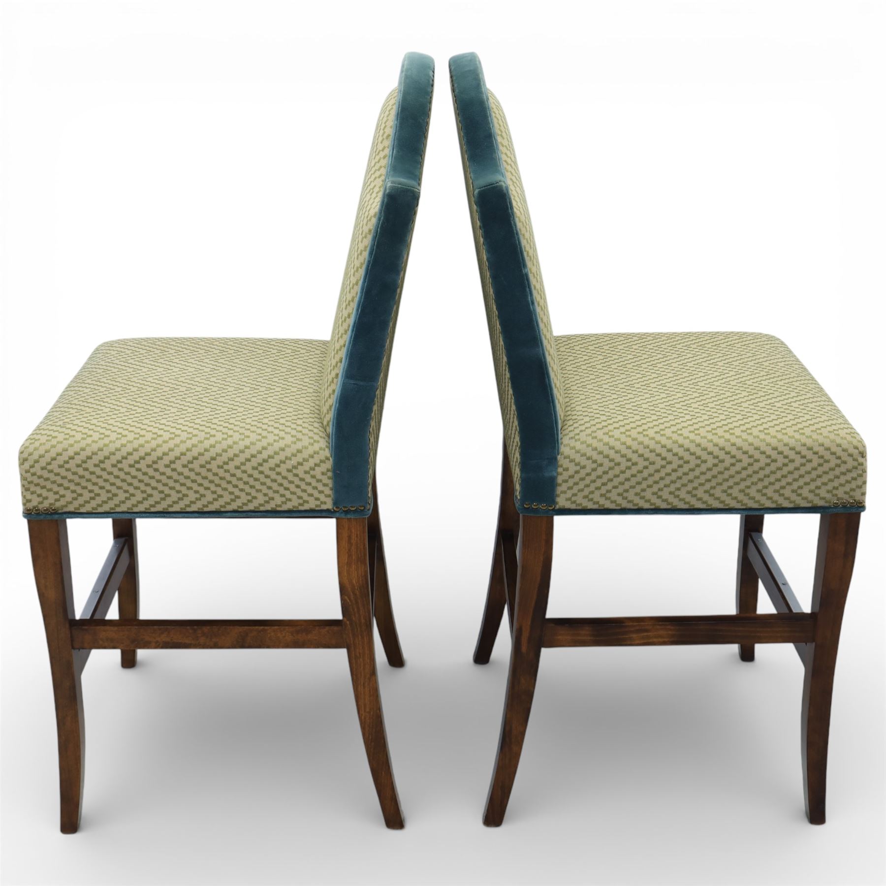 Pair of padded back high seat bar stools, upholstered in cream chevron fabric with green velvet trim 
