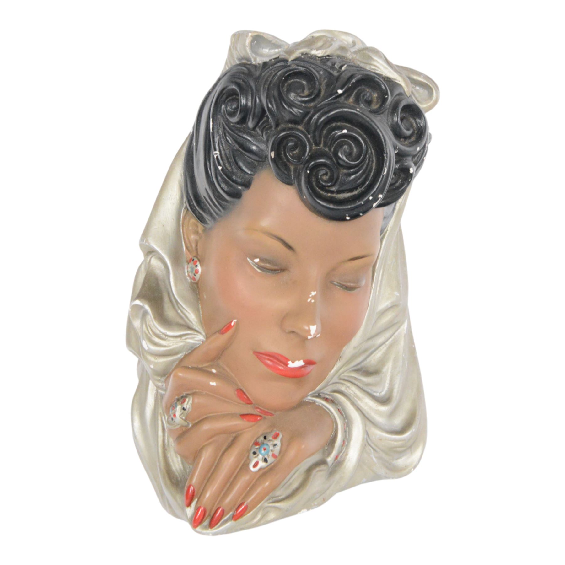 Art Deco style plaster wall mask, depicting a woman in a silver headdress with red lips and nails, H33cm