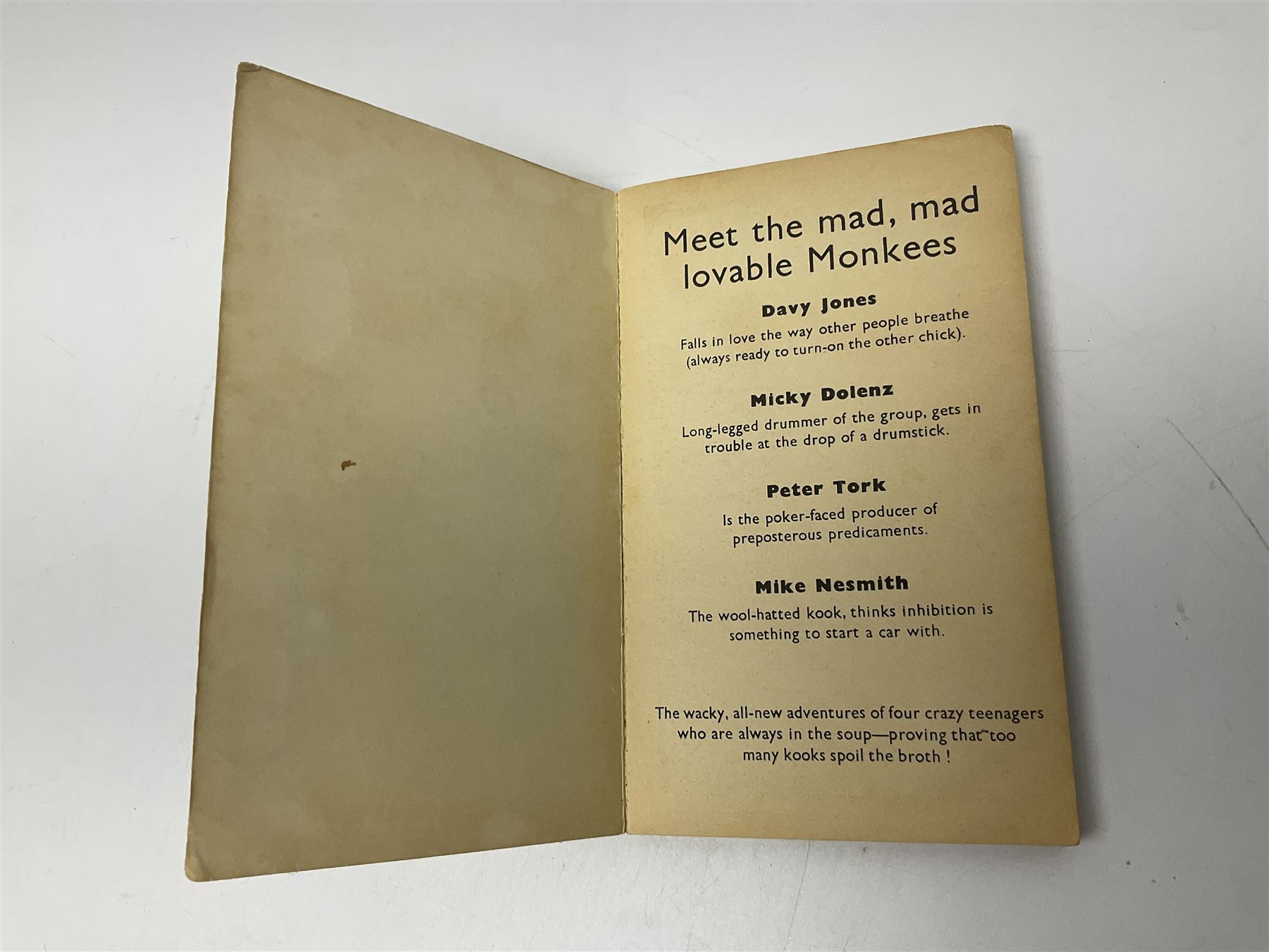 Monkees memorabilia - 'Monkees Monthly' magazine almost complete run from No.1 Feb 67 to No.31 Aug 69 (lacking nos.29 and 32); the cover of No.1 signed by all four members of the group during their 1997 Reunion Tour; quantity of A&BC bubble gum cards; programme for their only UK live performance in 1967 at Empire Pool Wembley; and other related late 1960s music magazines/paperback book
