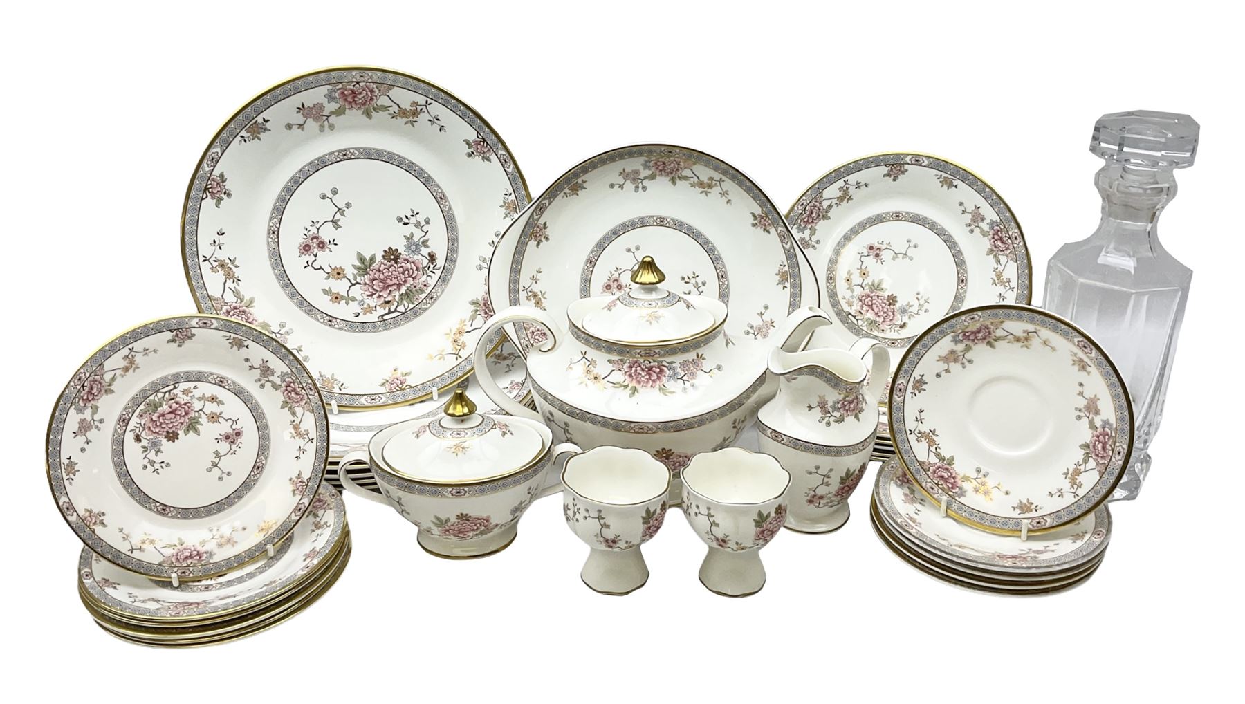 Royal Doulton Canton pattern tea and dinner wares comprising teapot, milk jug, twin handled lidded sucrier, cake plate, six dinner plates, six side plates, five smaller plates, five saucers and pair of candlestick holders, together with Sevres clear glass decanter with faceted sides and stopper, all with marks beneath