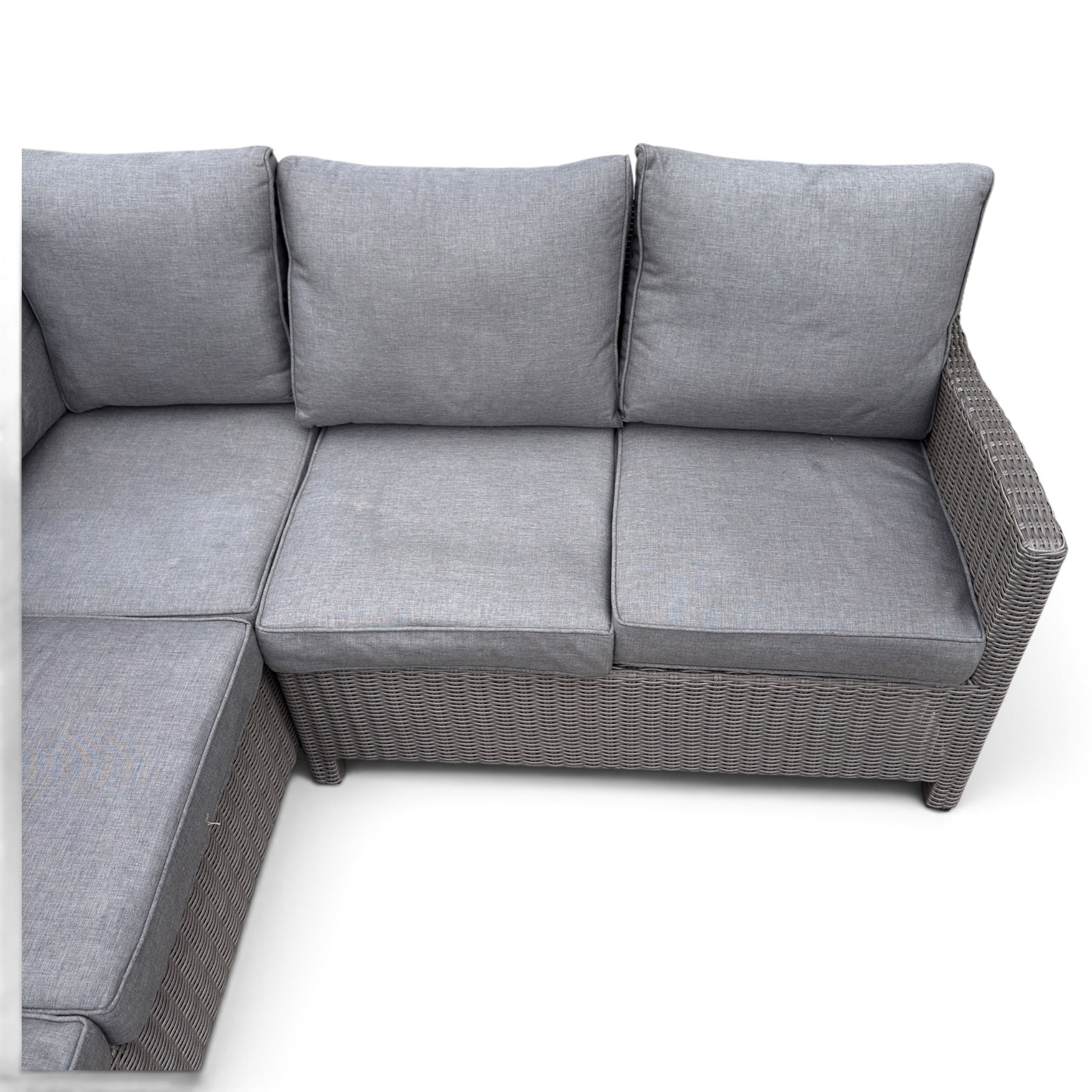 Kettler - Palma rattan garden lounge suite, comprising modular corner sofa (DIM) with slatted and rattan garden table on end supports (DIM), and three stools (DIM), with loose seat cushions