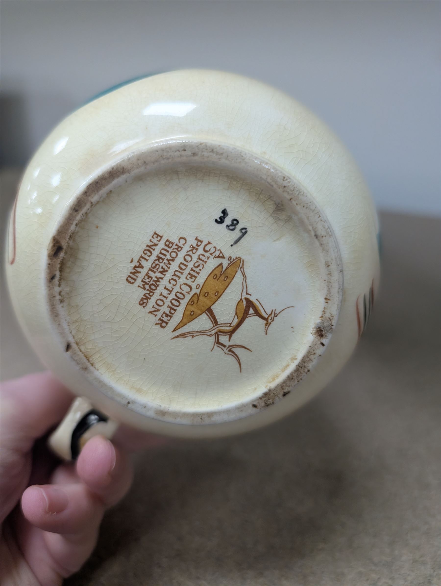 Collection of Susie Cooper ceramics, including jugs, vases and a teapot 