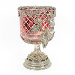 19th century silver plated and ruby glass wine cooler, of urn form, the cut ruby glass bowl with silver plated fruiting vine mount and twin vine handles, upon a spreading frilled stem and circular stepped foot, H33cm
