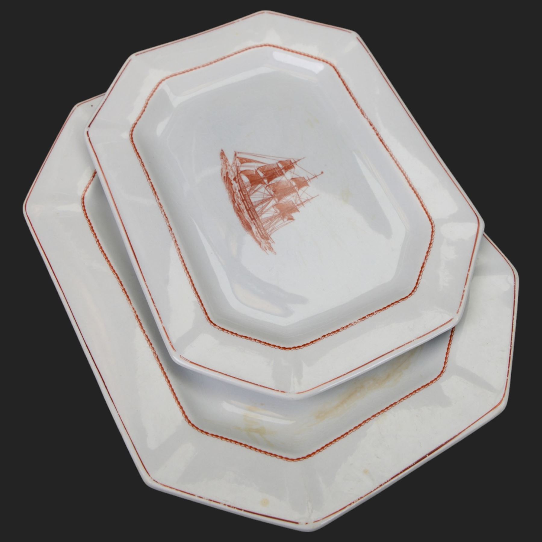 Wedgwood Flying Cloud Georgetown collection tea and dinner wares, including tureen, seven teacups, ten saucers, twelve side plates, three small bowls, two platters, thirteen dinner plates, etc, all decorated with red clipper ship and with printed marks beneath