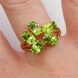 Silver-gilt five stone peridot cluster ring, stamped Sil