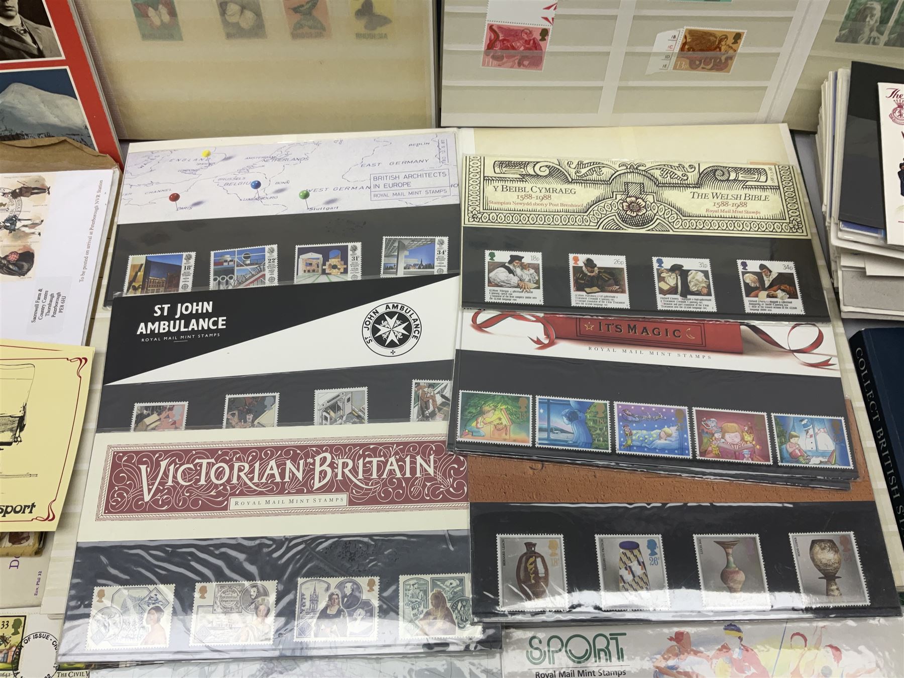 Great British and World stamps, including Queen Elizabeth II mint stamps in presentation packs, PHQ cards, Canada, Rhodesia and Nyasaland etc, in stockbooks and loose