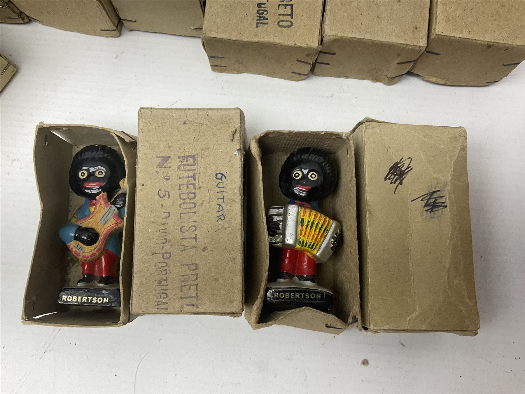 Collection of twenty two Robertson golly figures, H8cm