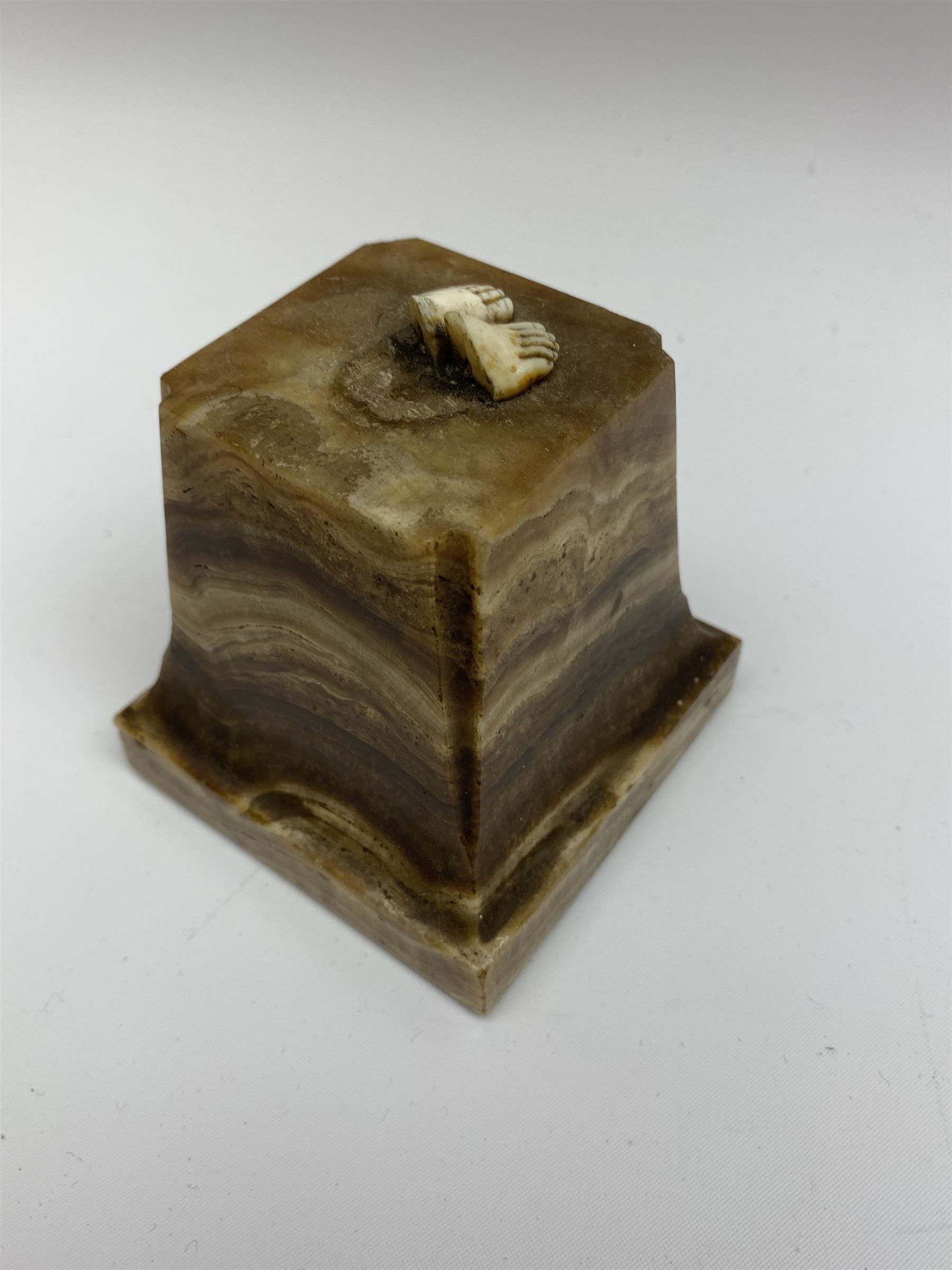 Demetre Chiparus (1886-1947): Innocence, a gilt bronze and ivory figure, circa 1925, standing in contemplative post with hands clasped, upon onyx plinth, signed to base, H24.4cm