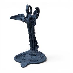 After Coalbrookdale cast iron heron stick stand, ornate detail with fish base, painted in matt black, 20th century