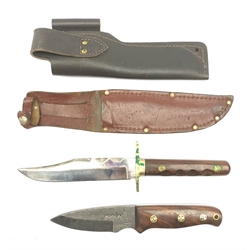 Perkin knife with 10cm damascus pamor type steel blade and metal studded hardwood grip, in associated leather sheath L27cm overall; and a Bowie knife, the 14.5cm blade marked William Rodgers Sheffield with brass crosspiece and rosewood grip, in leather sheathe L28cm overall (2)