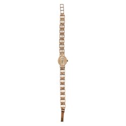 Royale ladies 9ct gold quartz wristwatch, on integral 9ct gold bracelet, hallmarked