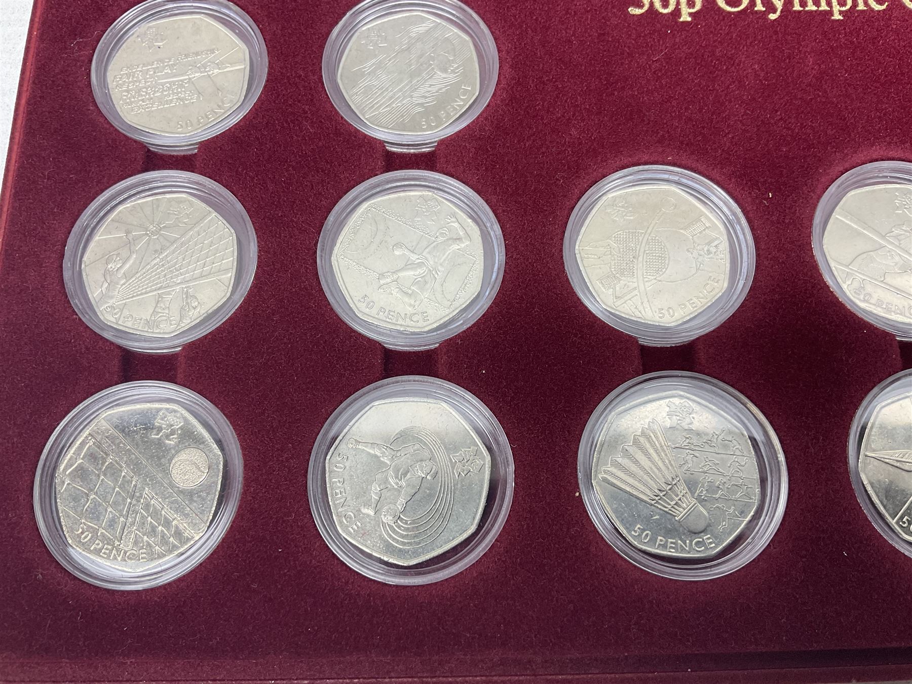 Queen Elizabeth II United Kingdom London 2012 Olympic commemorative fifty pence collection comprising twenty-nine coins, housed in unofficial display case