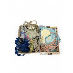 Collection of curtain fabric pieces and tassels