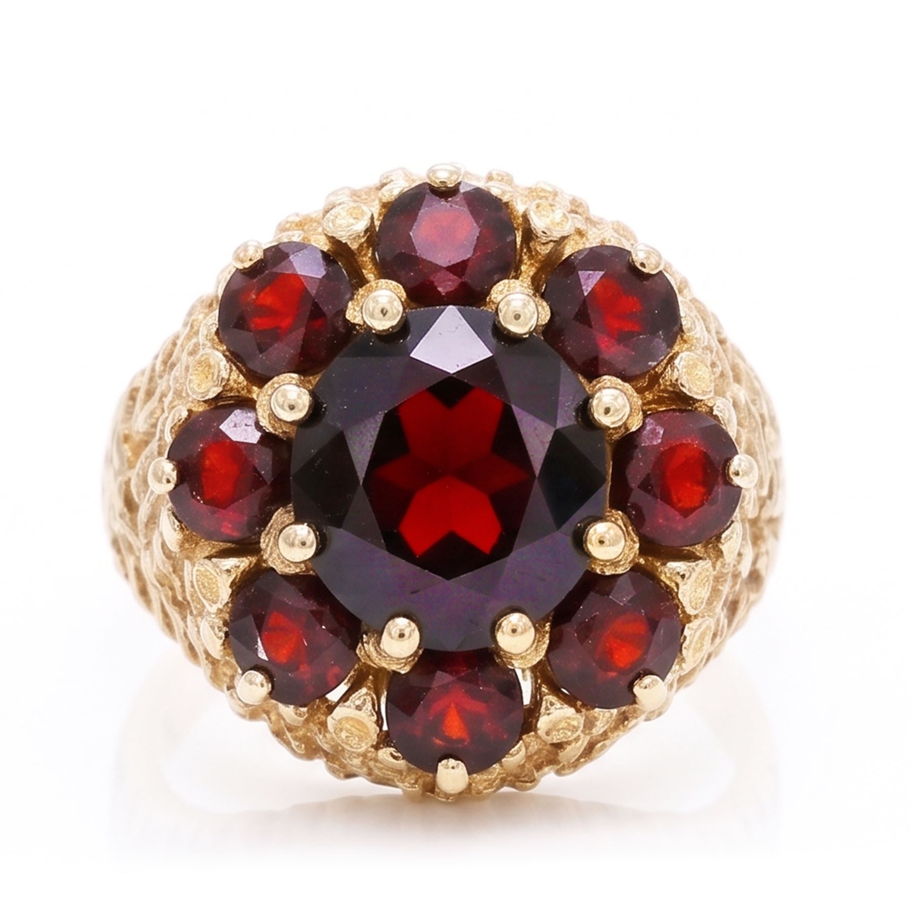 9ct gold garnet cluster ring, set with nine round cut garnets, with textured gallery and shoulders, hallmarked