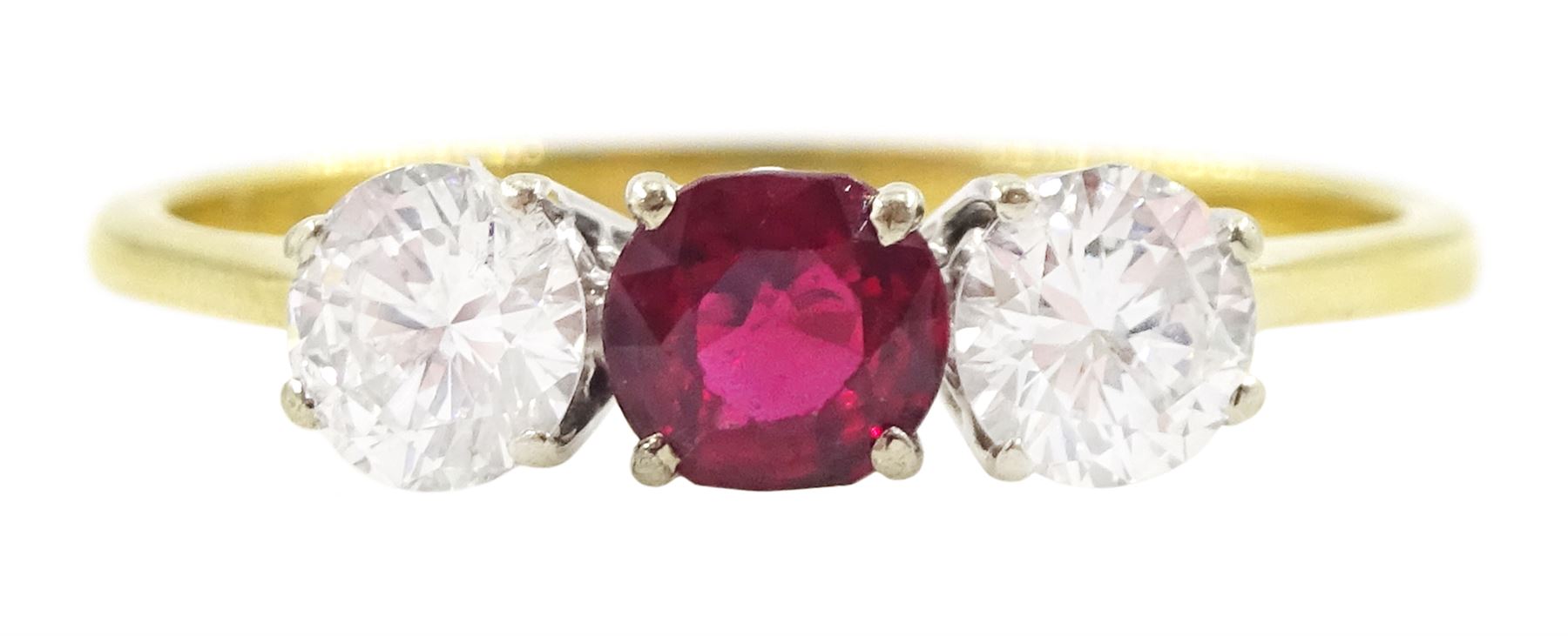18ct gold three stone ruby and round brilliant cut diamond ring, London import mark 1973, ruby approx 0.30 carat, total diamond weight approx 0.55 carat