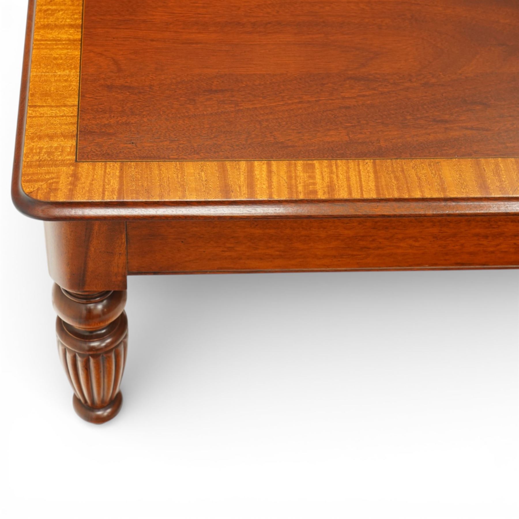 Georgian design mahogany coffee table, square top with satinwood crossbanded border above plain frieze, raised on turned and fluted supports