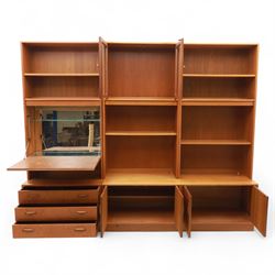 G Plan - Mid 20th century teak sectional wall cabinet, comprising six modular units including a fall front bureau, glazed display cabinet, open bookcase, cupboard and drawer bases, each with recessed handles and flush plinths