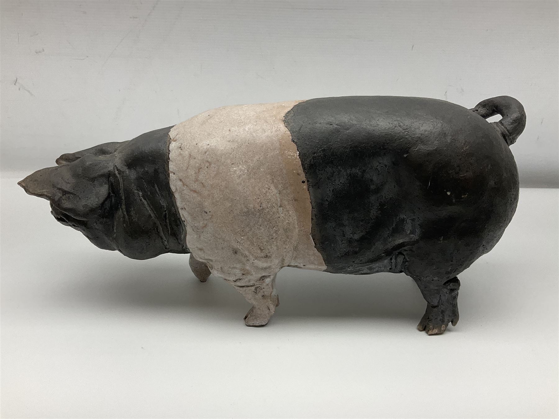 Studio pottery Saddleback pig, with artist signature beneath, H18cm, L39cm
