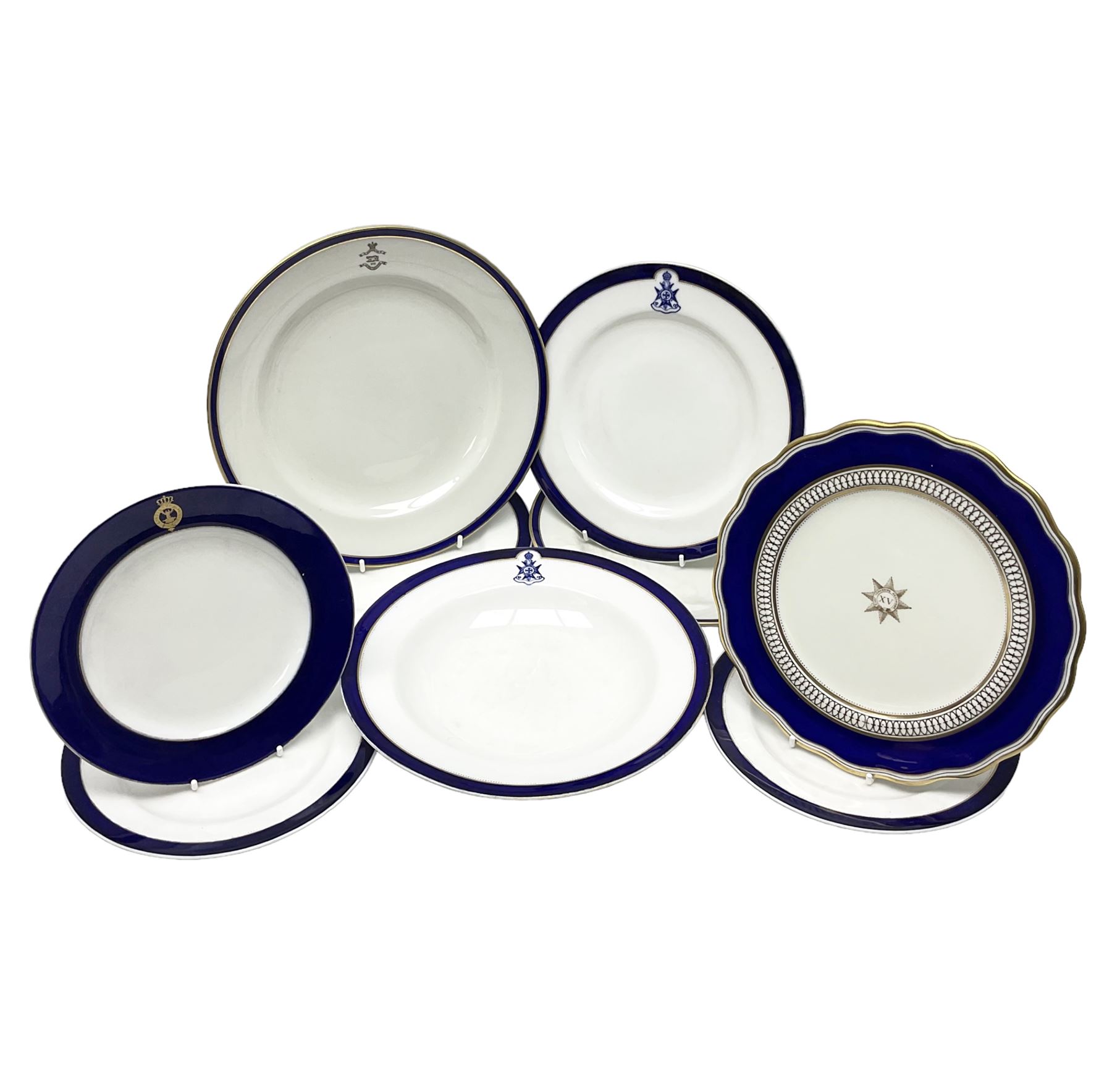 Collection of Regimental dinner wares, Comprising Royal Sussex; two dinner plates, two side plates and a soup bowl, Royal Leicestershire; two dinner plates, East Yorkshire Regiment side plate and Gordon Highlanders side plate, all decorated with the regiment's crests and blue and gilt boarders (9)