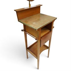 Early 20th century oak valet stand, raised back withy circular swivel mirror, over fall front compartment, raised on square supports united by concave under-tier