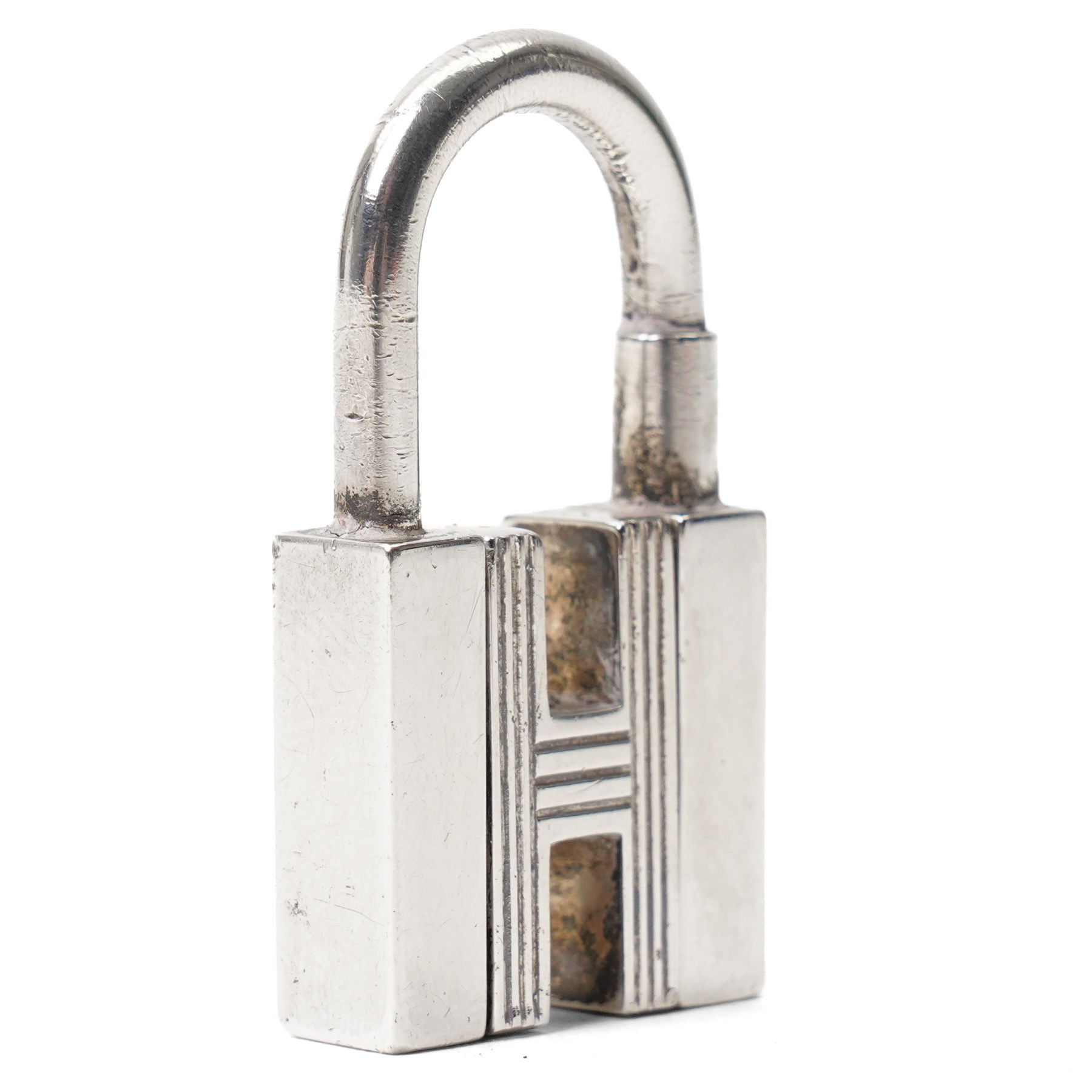 Hermès - sterling silver Cadena H padlock charm, modelled as the letter H with hinged shackle, stamped Hermès and with French silver assay mark, with original  box
