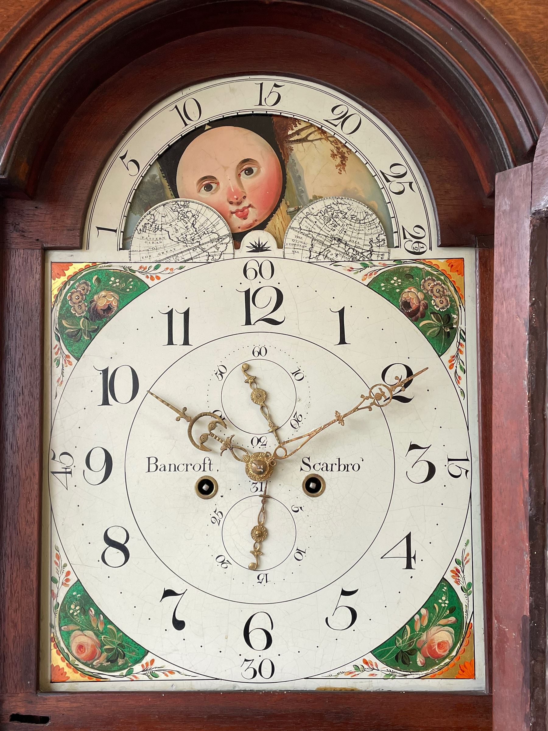 John Bancroft of Scarborough - a fine late George III 8-day mahogany longcase clock, with an elaborate pagoda pediment, brass ball and eagle finials and oval conch shell inlay, break arch hood door flanked by reeded pilasters with brass Corinthian capitals, trunk with inlaid canted corners and a break arch trunk door with 