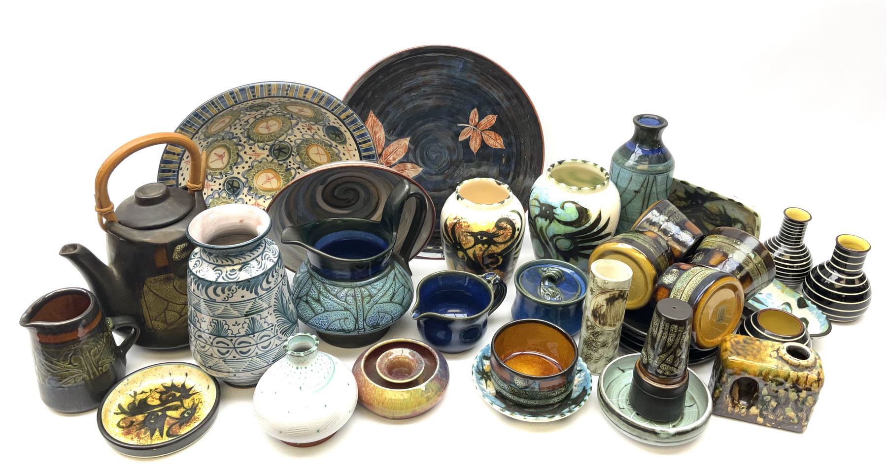 A group of assorted Studio Pottery, to include various Cornish Celtic Pottery, Wold pottery bowl, Micklegate pottery bowl, a small Troika style vase of cylindrical form, etc. 