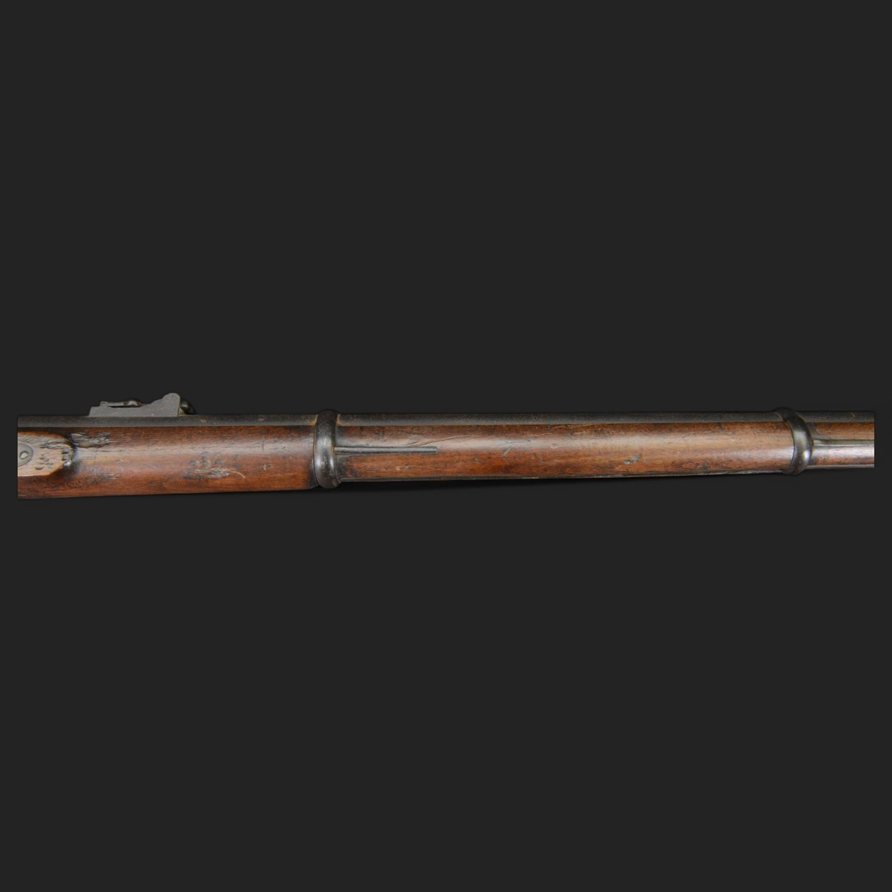 Two-Band short service musket, the L66cm barrel with sold out of service marks and indistinct marks, with ram rod beneath, the lock marked with crowned and Windsor 1855, overall L108cm
Sold as an exempt item under Section 58 (2) of the 1968 Firearms Act, to be held as a curiosity or ornament