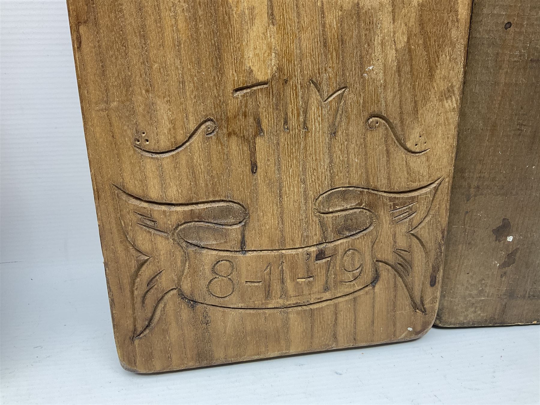 Eight 20th century hardwood Dutch folk art Speculaasplank or biscuit moulds, most examples typically carved with figures in traditional dress, tallest H60cm