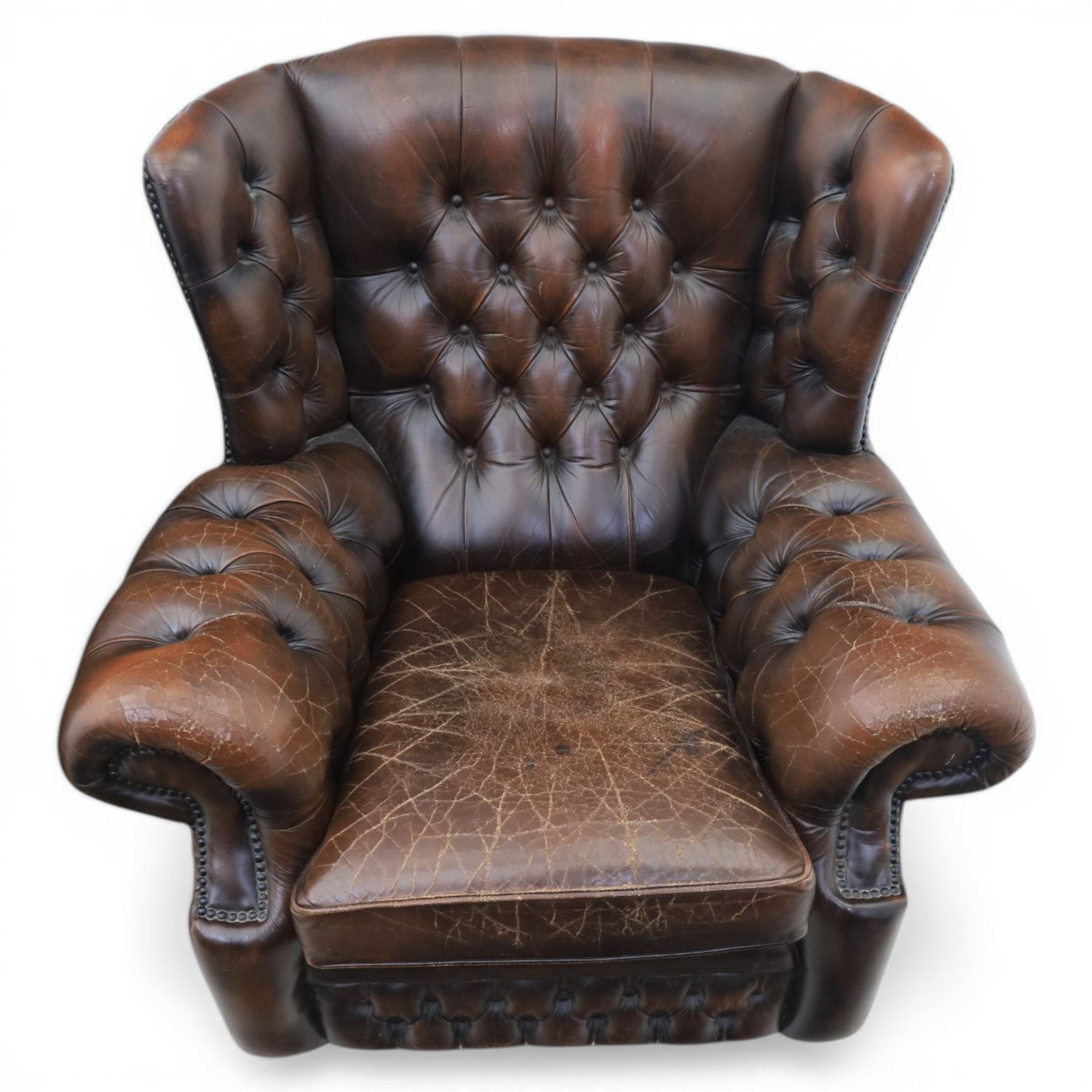 Georgian design Chesterfield lounge suite, comprising highbacked four seat sofa and pair armchairs, upholstered in chocolate brown leather, Armchairs (H 90cm, W 91cm) Sofa (H 91cm, W 238cm)