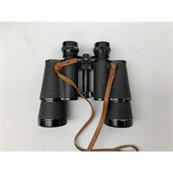 Four pairs of binoculars comprising Carton 10x50, G.F.Smith & Son Ltd 8x30 housed in a leather case, Zenith 10x50 cased and a pair of antique binoculars marked ‘8 Lenses’