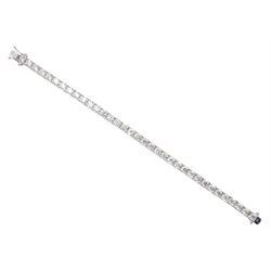 White gold round brilliant cut line bracelet, stamped 18K, total diamond weight approx 11.25 carat