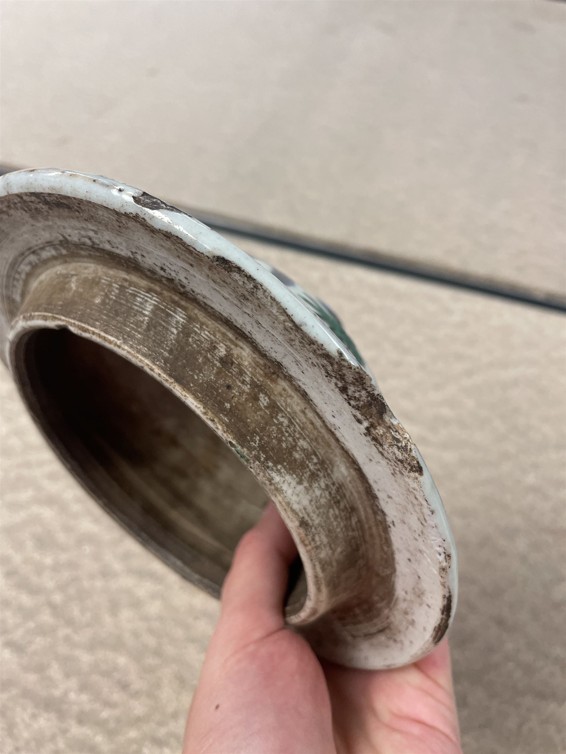 17th century Transitional period Chinese Wucai vase and cover, of baluster form, the body painted with ladies upon a terrace, and figures upon horseback and attendants within a fenced garden, the domed cover with knop finial painted with boys at play, H37cm
