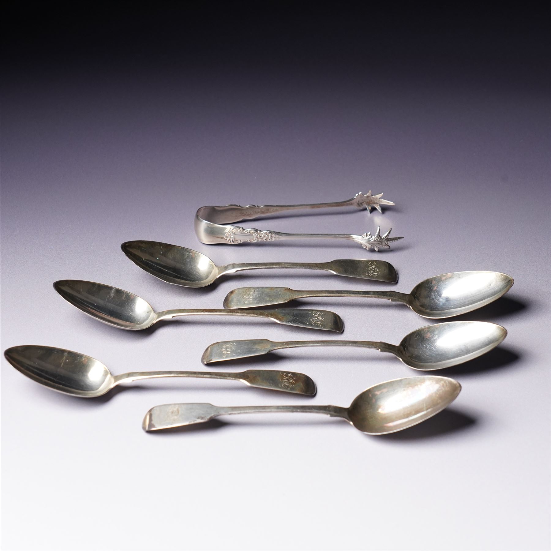 Set of six George IV silver fiddle pattern tea spoons London 1827 engraved with initials and a pair of later sugar tongs