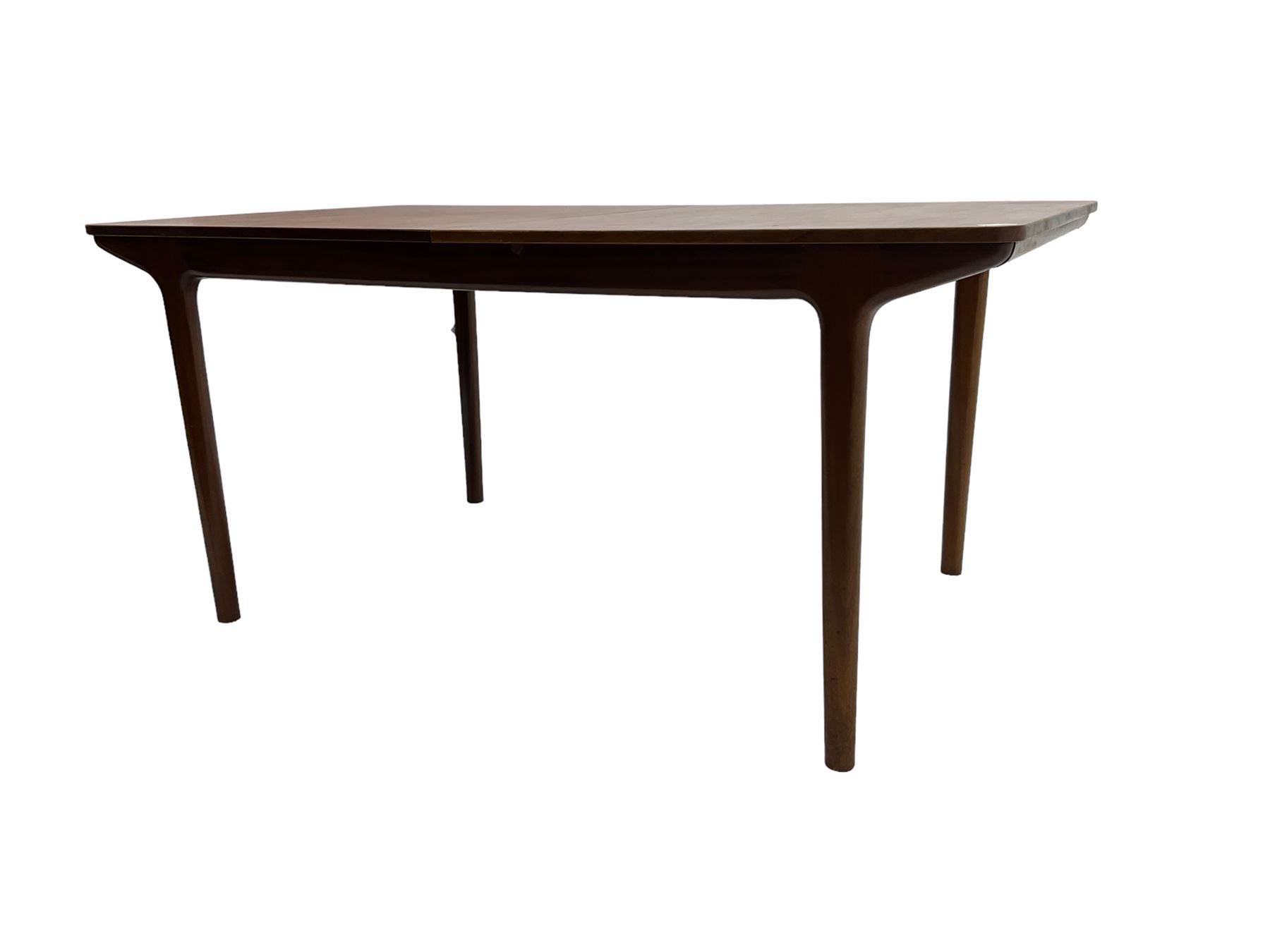 Tom Robertson for AH McIntosh & Co of Kirkaldy - mid-20th century teak extending dining table, rectangular top with rounded corners, concealed integrated double leaf, raised on tapered supports, metal label to underside of leaf