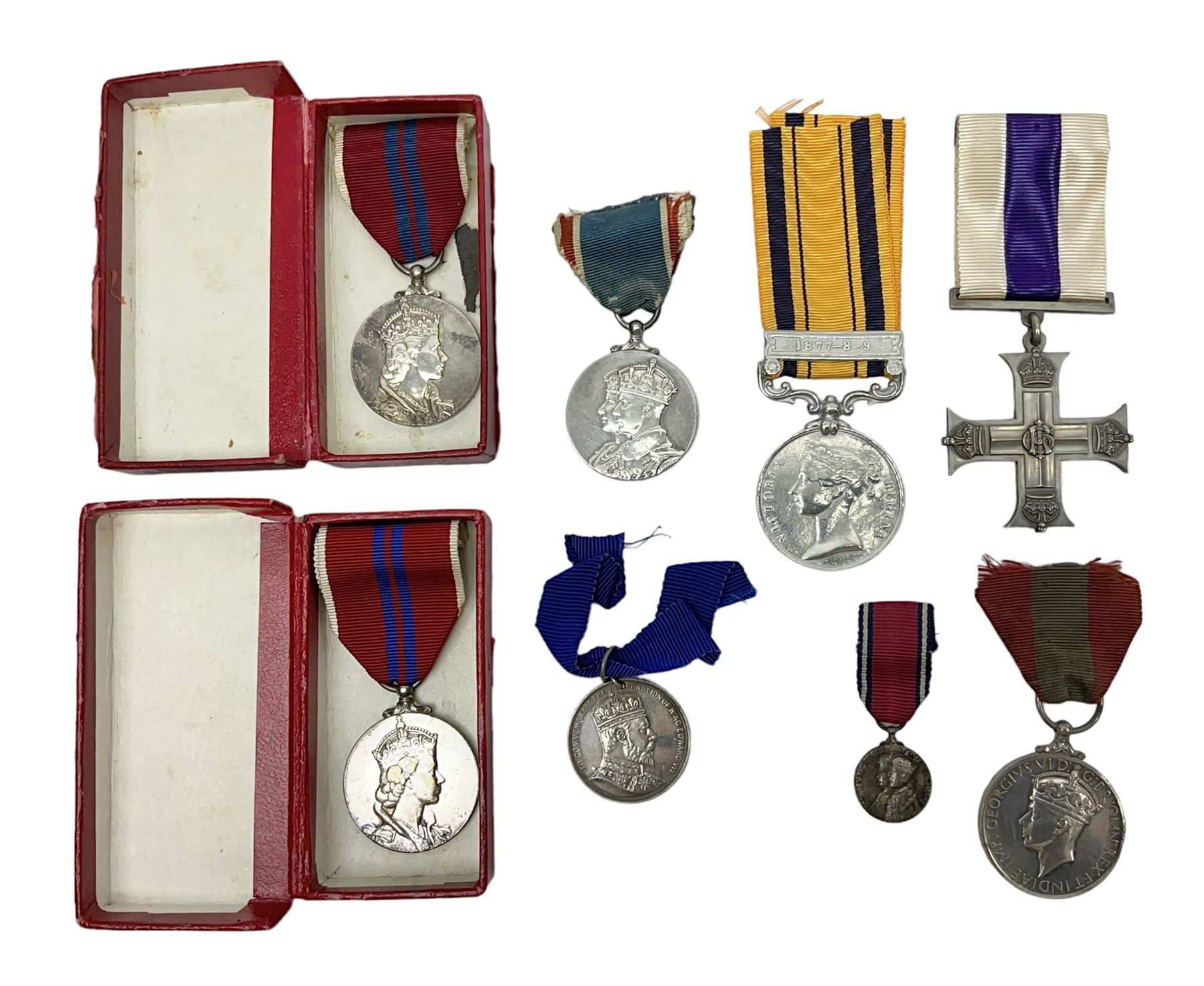 Imperial Service Medal awarded to James Roscow; four coronation medals for Edward VII, George VI and two Elizabeth II (both boxed); George V silver jubilee miniature; and two replica medals - Military Cross and Victoria South Africa 1877-8-9 (8)