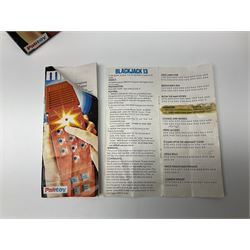 Three late 70s/early 80s handheld electronic games; Bandai Electronics Arcade ‘Gunfighter’ (1980), Grandstand ‘Invader From Space’ (1980), Palitoy ‘Merlin The Electronic Game Machine’ (1979) with game sheet and instruction booklet, all with original boxes (3) 