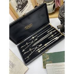 WW2 American Fairchild F-71 binocular magnifying telescope, in green painted wooden carrying box with instruction leaflet L48cm; WW2 Air Ministry Astro Compass Mk.II Ref. 6A/1174(0); Zenith Projection & Camera Lucida Attachment RA-6, boxed with instructions and 1977 purchase invoice; two cased sets of drawing instruments; and a boxed Faber slide rule (6)