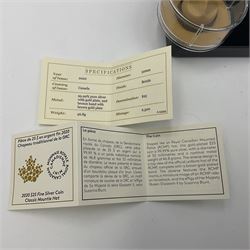 Royal Canadian Mint 2019 'Canada's Unexplained Phenomena The Shag Harbour Incident' fine silver twenty dollar coin and 2020 'Classic Mountie Hat' fine silver twenty-five dollar coin, both cased with certificates
