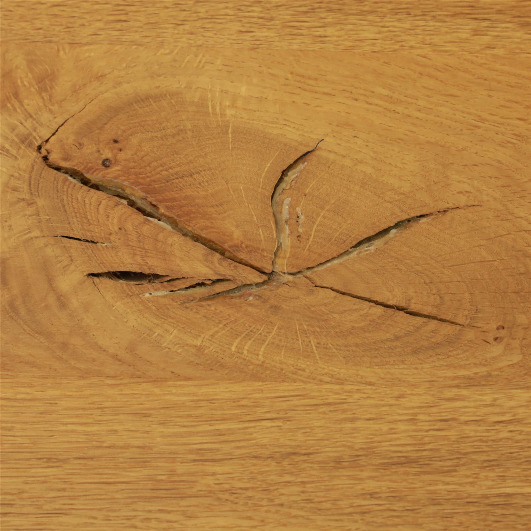 Contemporary light oak dining table, painted tripod bases with stretcher 