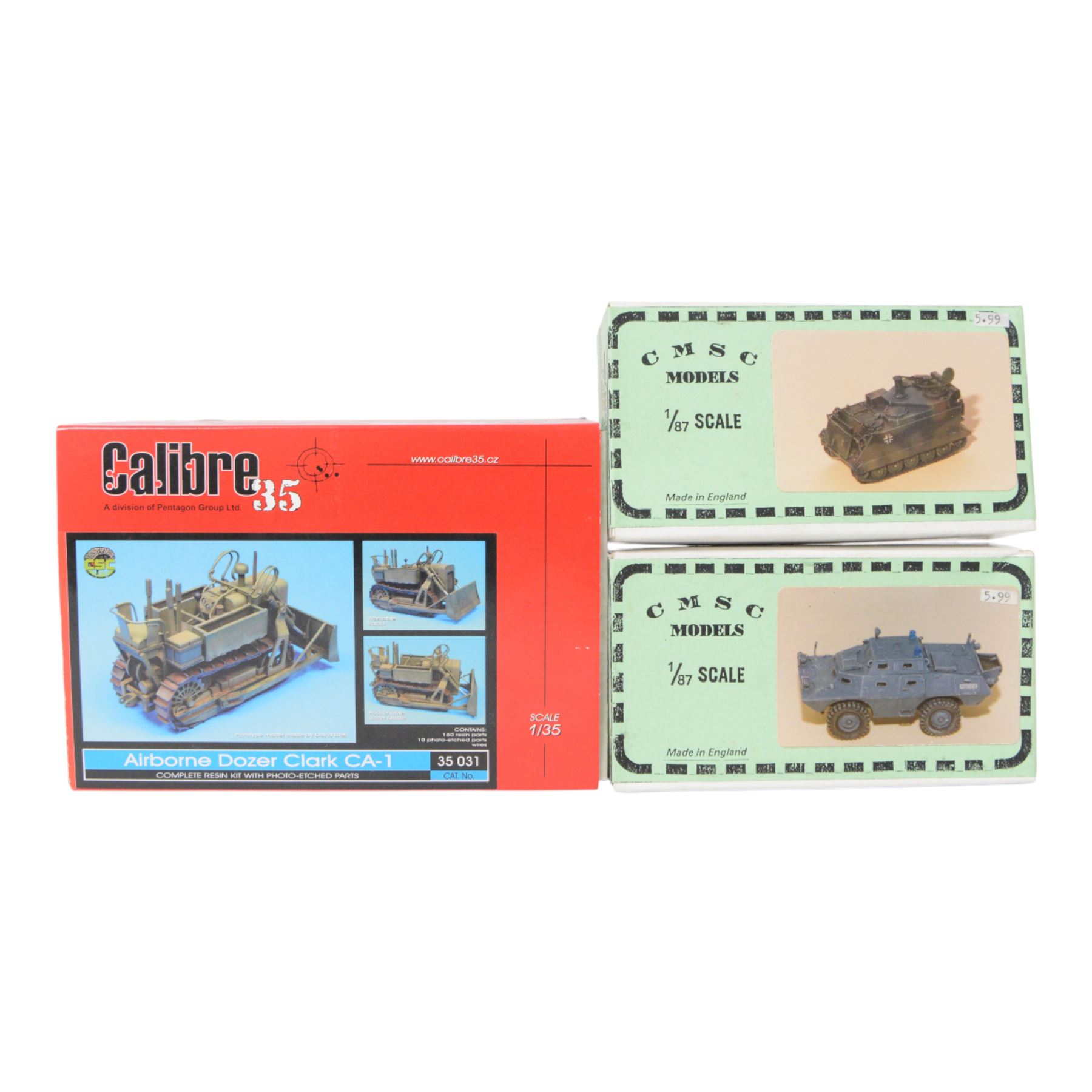 Nine military vehicle model kits, including five 1:76 and 1:87 scale Continental Model Supply Company kits, three 1:76 scale Milicast Premiere Range kits and a Calibre 35 1:35 scale Clark CA-1 Airborne Dozer kit, all boxed