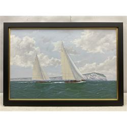 George Drury (British 1950-): 'Velsheda and Shamrock off the Needles', oil on board signed, titled verso 74cm x 49cm