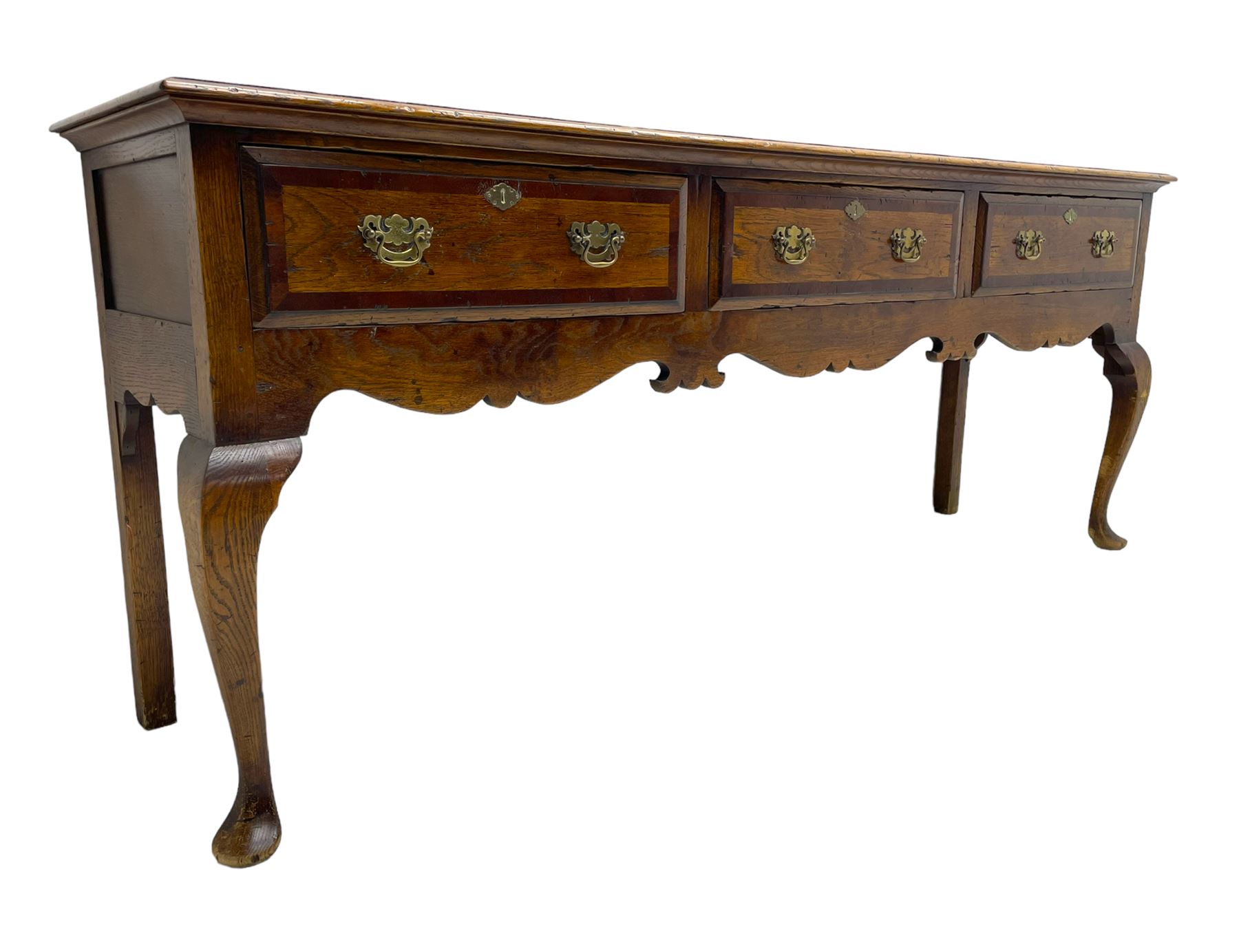 Georgian design oak dresser base, moulded rectangular top over three drawers with moulded fronts and mahogany bandings, shaped apron on cabriole front supports