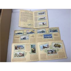 Quantity of cigarette and trade cards, housed in albums and loose, by W.D. & H.O. Wills, John Player & Sons etc, including cycling, garden hints, Britain's railways, dogs etc and various empty vintage cigarette card albums, in two boxes