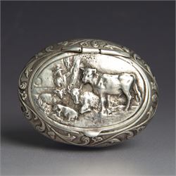 Dutch silver snuff box, of oval form, the hinged lid decorated in relief with cattle and f...