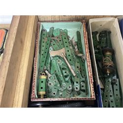 Meccano - quantity of loose sections in red and green; in scratch built wooden box